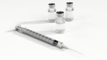 Personalized Medicine - Syringe and Pharmaceutical Vials